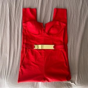 Material girl red jumpsuit With gold buckle